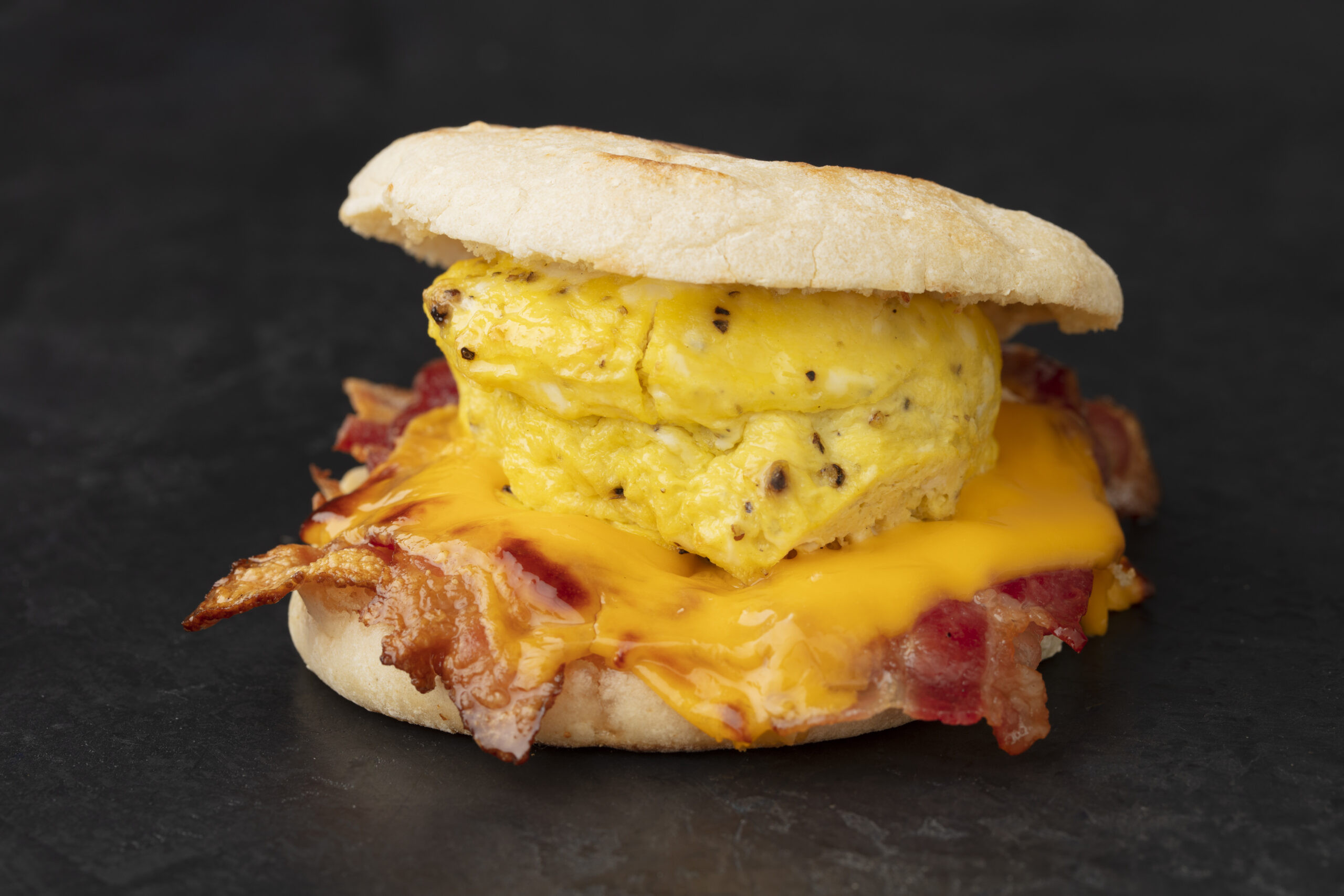 Bacon Egg and Cheese Breakfast Sandwich from Street Corner Fresh Food Service, highlighting the fresh and convenient breakfast options at your local street corner store.