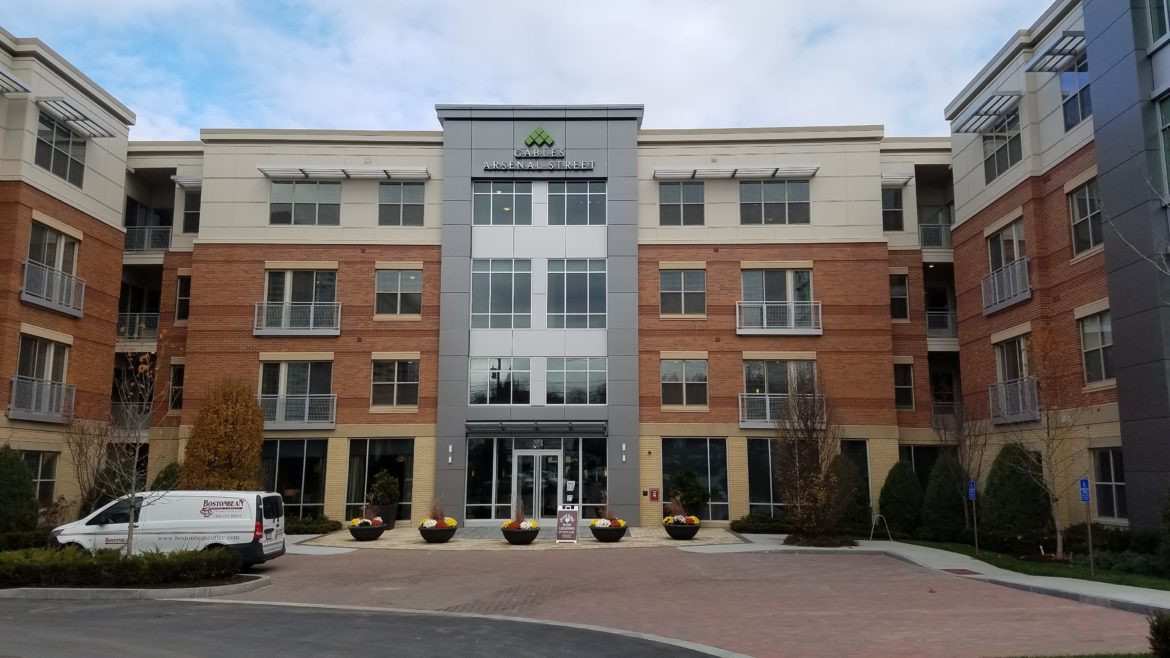 Exterior view of Gables Arsenal Street apartments in Watertown MA, showcasing modern architecture and landscaping