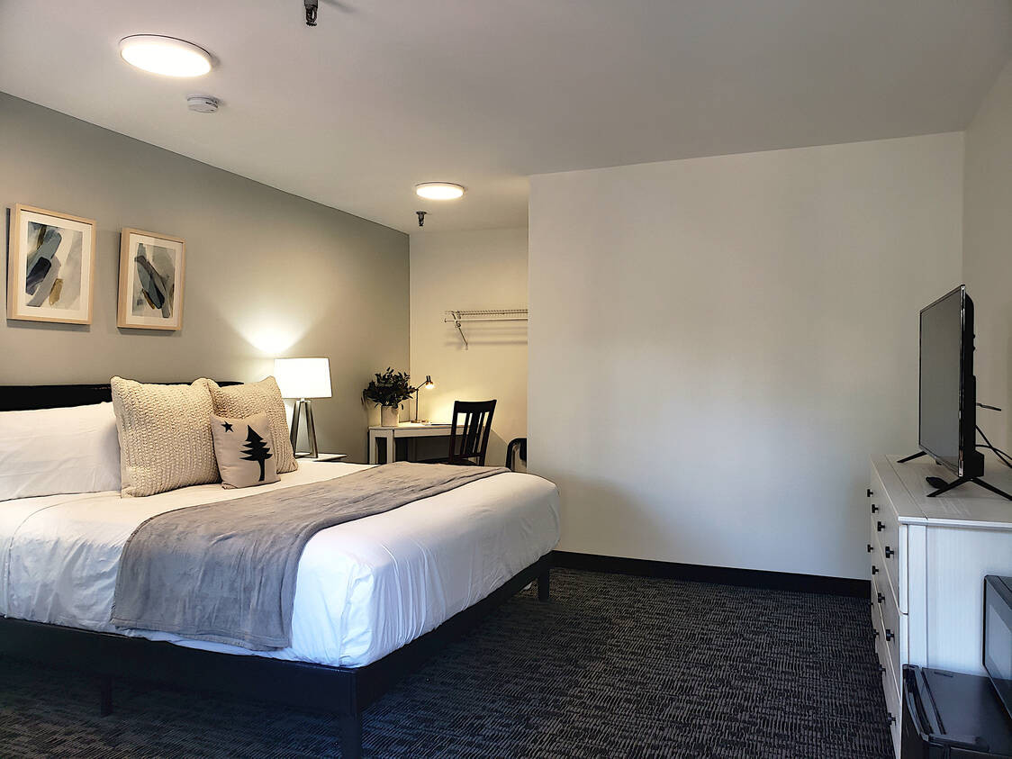 Close-up of the modern amenities in a King Room at Main Street Motel, including microwave and mini-fridge.
