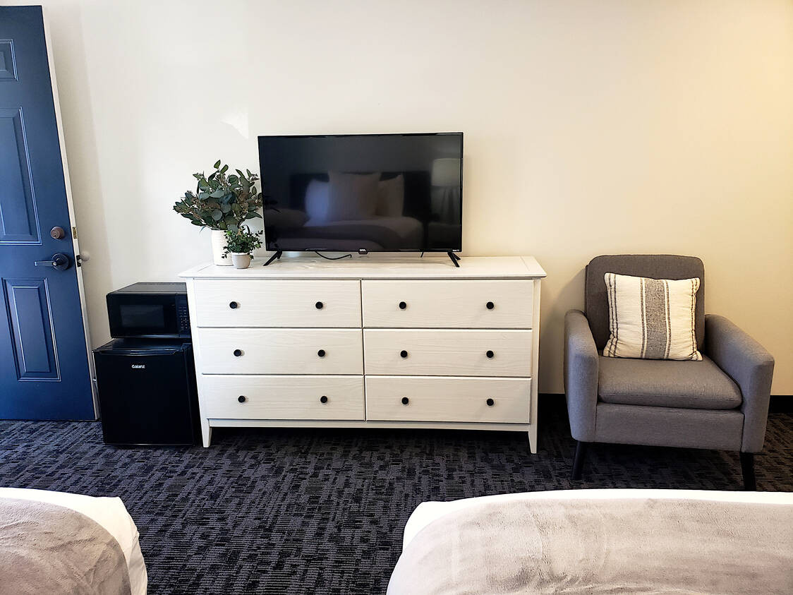 Interior detail of a King Room at Main Street Motel, showing the contemporary furnishings and decor.