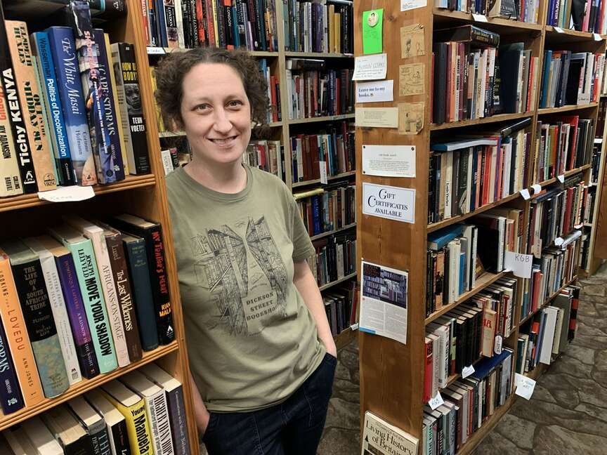Suedee Hall Elkins, the new owner of Dickson Street Bookshop, stands in the Fayetteville store, ready to carry on the vision of its founders.