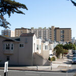 Rendering of 2550 Irving Street affordable housing project in San Francisco's Sunset District, viewed from the intersection of Lincoln and 27th Avenue, designed by Pyatok Architects.
