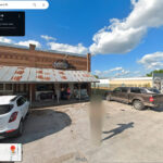 Original Google Maps Street View screenshot of 324 Front St Barnum Iowa showing the uncensored image.