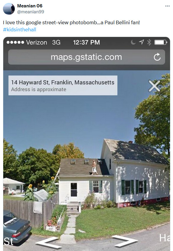 Meme image of a man in a towel photobombing a Google Street View car on a rooftop.