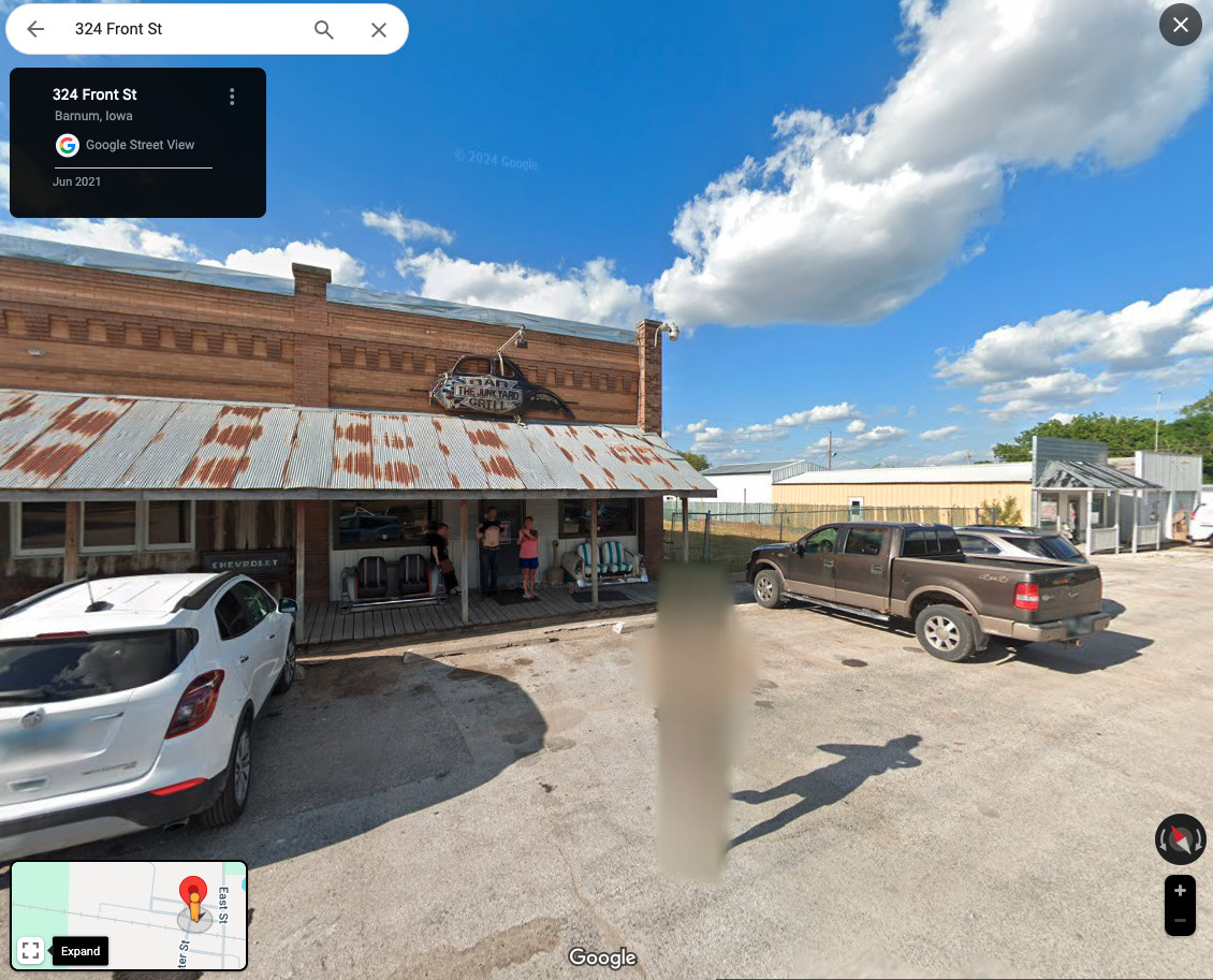 Original Google Maps Street View screenshot of 324 Front St Barnum Iowa showing the uncensored image.