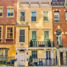 328 East 51st Street, Yellow Townhouse with Sculptures