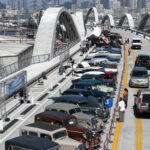 Crowds celebrate the grand opening of the Sixth Street Viaduct in Los Angeles, July 2022
