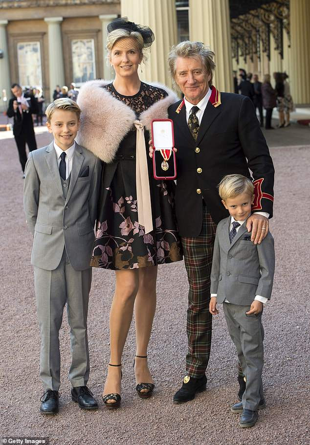 Rod Stewart with Penny Lancaster and his younger children, Alastair and Aiden, showcasing his family life alongside his wife and sons