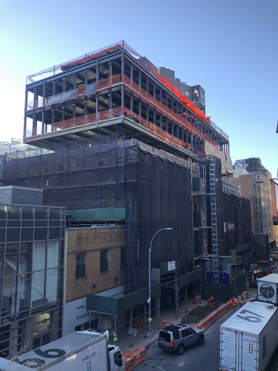 Final stages of construction at 520 West 20th Street, New York, NY, as the building nears completion, showcasing the finished facade.