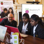 Young learners engage in a Code Club session at Number 10 Downing Street, highlighting the importance of technology education.