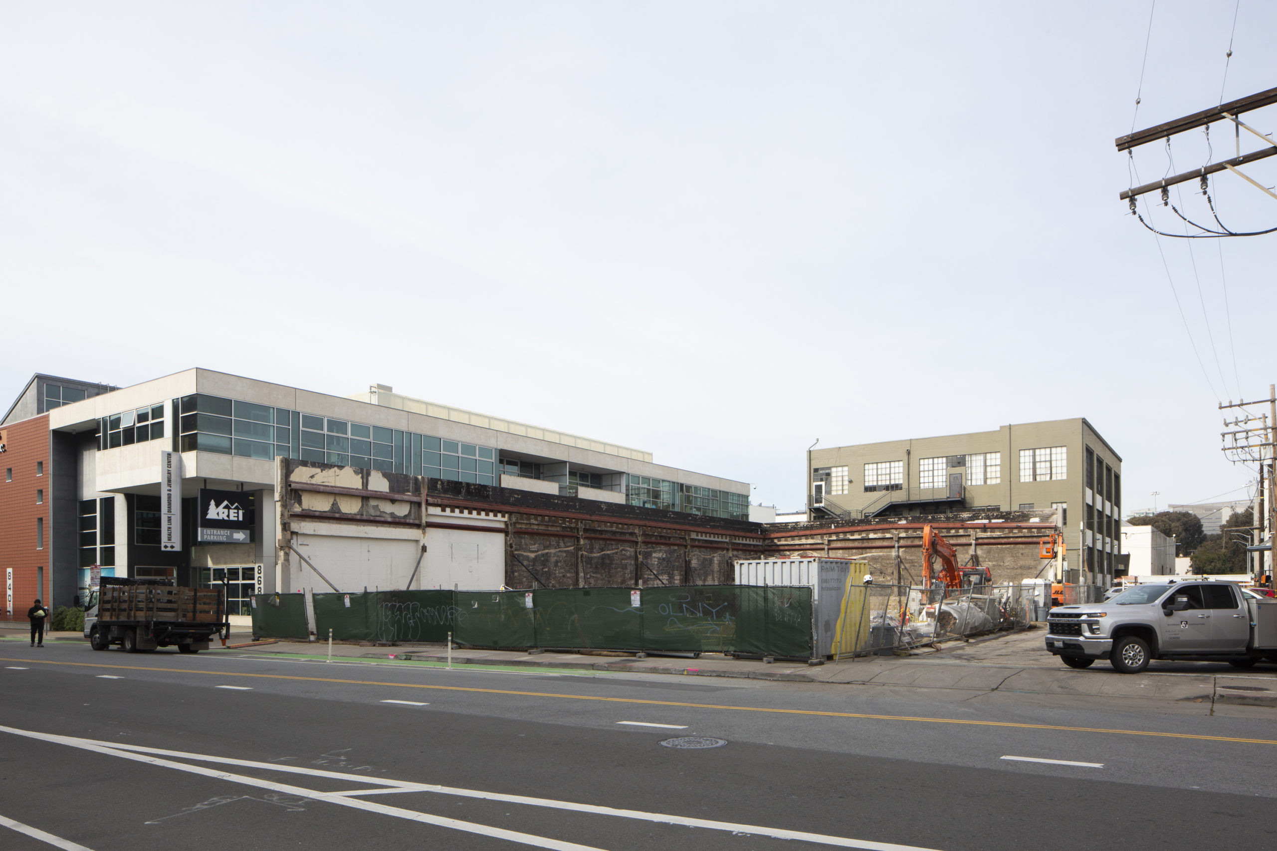 Demolished site at 828 Brannan Street ready for new construction, adjacent to REI store.
