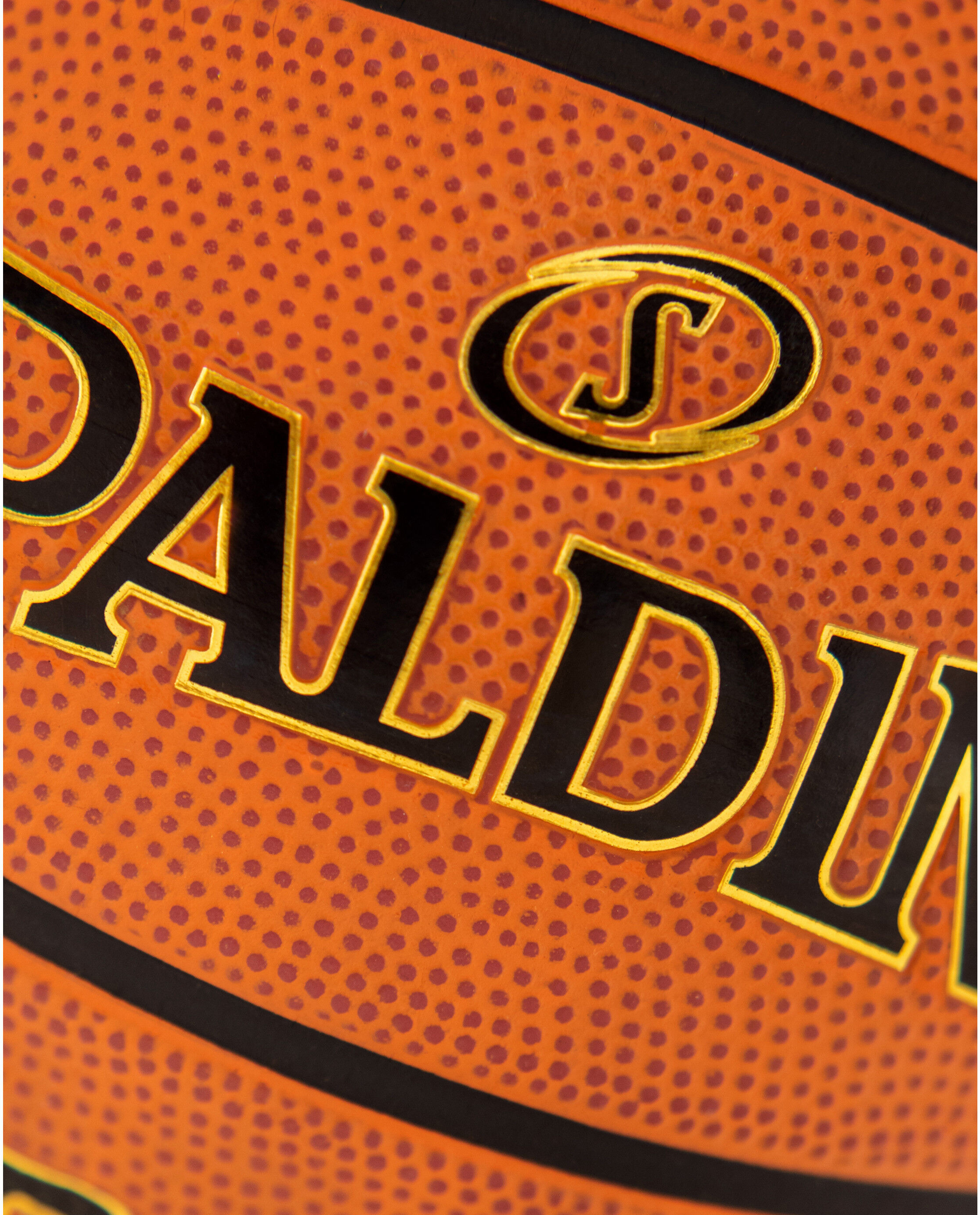 Close up of Spalding Street Outdoor Basketball deep channel design for enhanced street ball grip