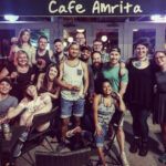 Cafe Amrita 110th Street bustling with patrons in pre-pandemic days, showcasing its award-winning neighborhood hangout atmosphere.