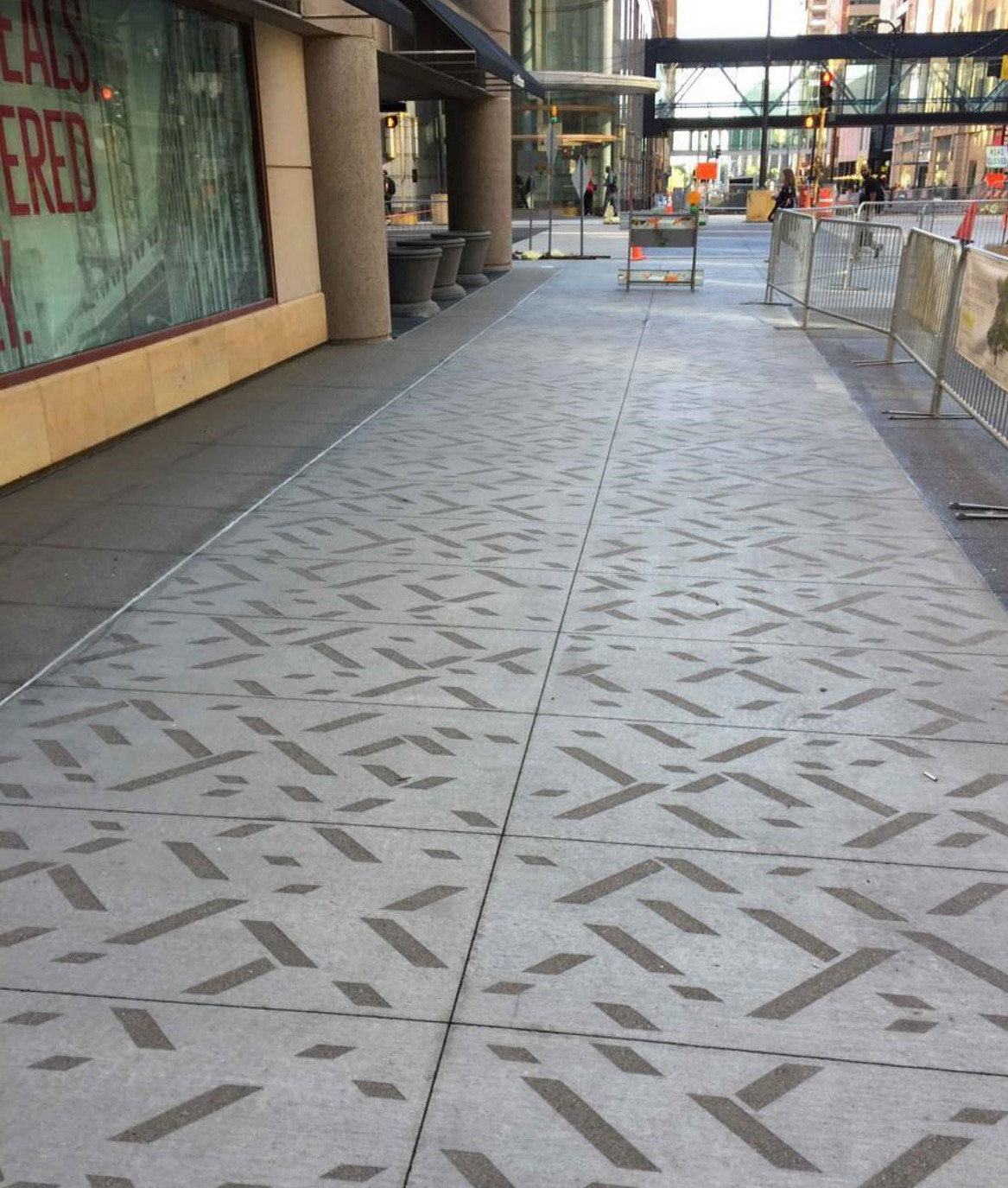 Sidewalk aesthetic treatments being considered for East 7th Street, showcasing various textured and patterned sidewalk options.