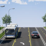Road view of East 7th Street showcasing design elements like bike lanes, bus lanes, turn lanes, and a pedestrian trail.