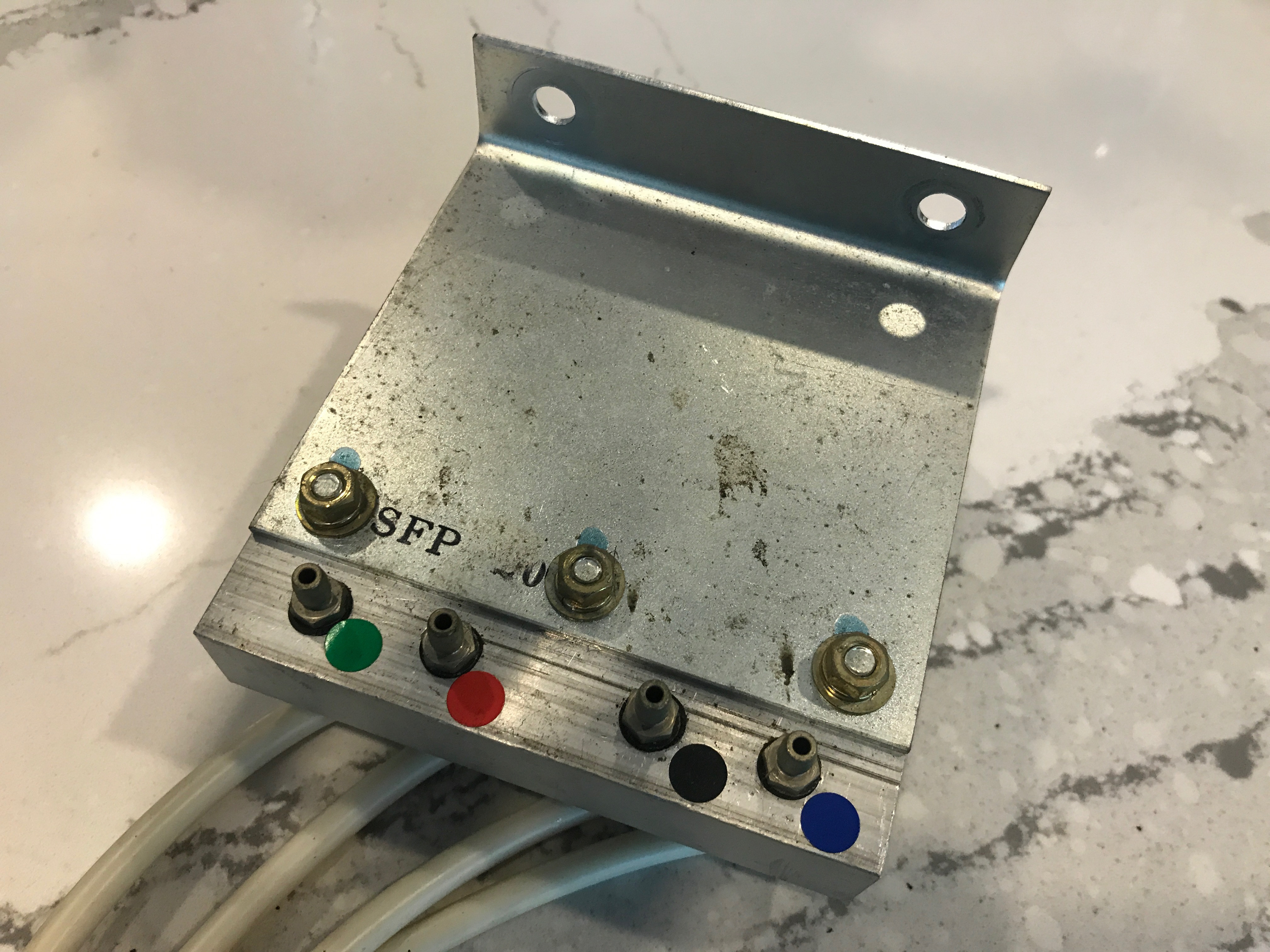 Close-up view of the Junction Box, showing its construction and pneumatic connectors.