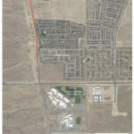 Aerial view of 118th Street in Albuquerque, highlighting the surrounding residential areas and mesa, with emphasis on the planned improvement zone between Dennis Chavez Blvd SW and Amole Mesa Ave SW, showcasing the need for enhanced pedestrian and cyclist infrastructure.