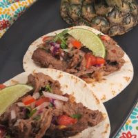 Delicious air fryer Tijuana street tacos recipe served with pico de gallo and lime.