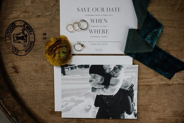 Elegant wedding invitations displayed at King Street Brewing, Anchorage wedding celebration