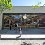 Exterior of the Apple Store on Fourth Street in Berkeley CA, showcasing its modern facade and prominent Apple logo.