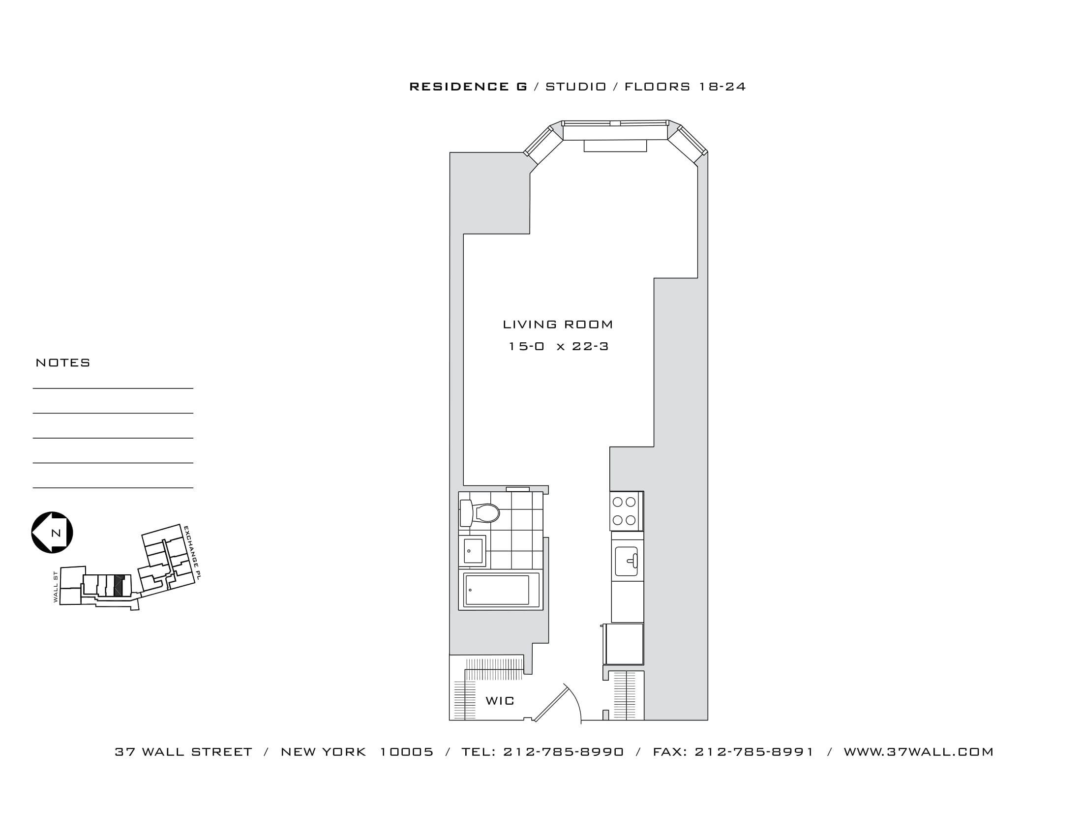 Well-lit studio apartment at 37 Wall Street featuring large windows and city views