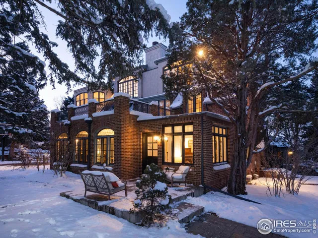 Front view of 749 15th Street Boulder Colorado, highlighting the red brick facade and Tudor architectural details