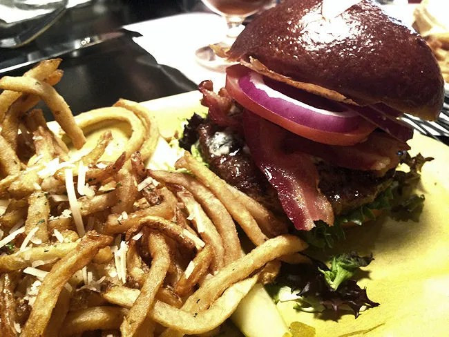 Delicious Tap House Blue Burger with Truffle Fries at Center Street Tap House Portage Michigan