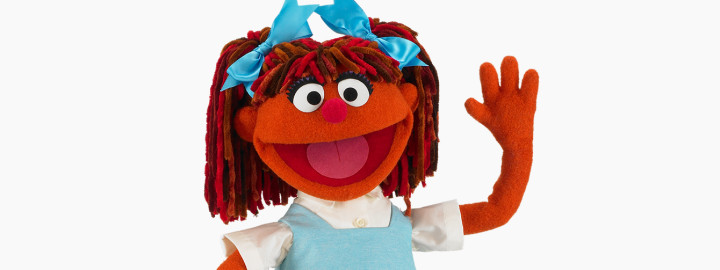 Chamki Sesame Street Indian Muppet character with detective hat and magnifying glass