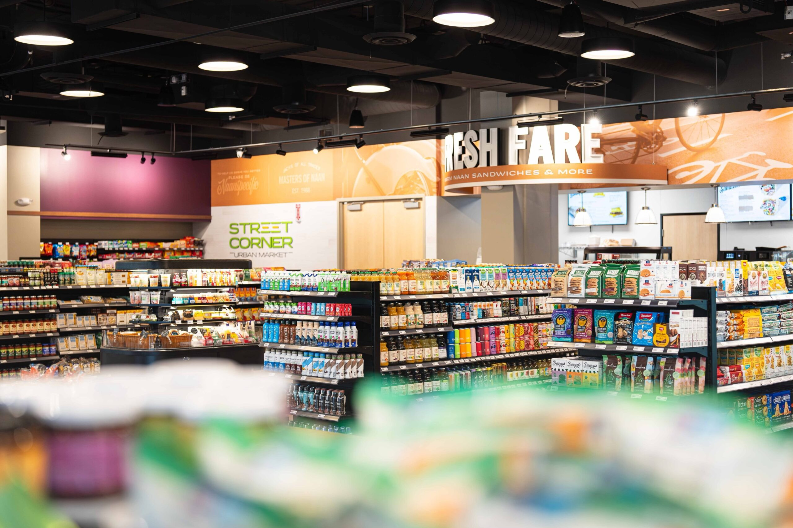 Interior wide view of a Street Corner Culdesac Fuel Station, illustrating the spacious layout and diverse product offerings beyond typical street corner gas station fare.