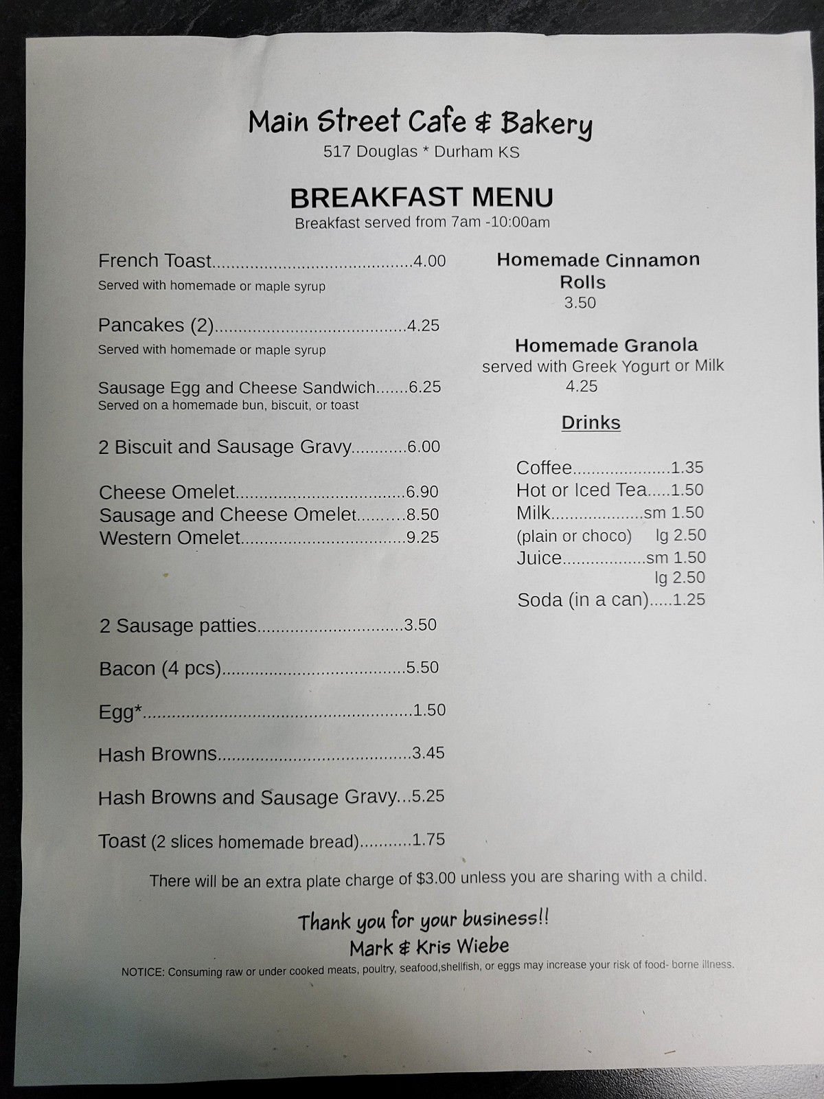 A portion of the Main Street Cafe &amp; Bakery menu board displayed on their Facebook page, listing various sandwiches, burgers, and daily specials.