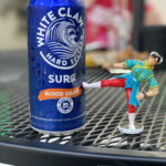 Chun-Li action figure from the 1994 Street Fighter movie toy line posed on a wooden deck, photographed by Kyle.