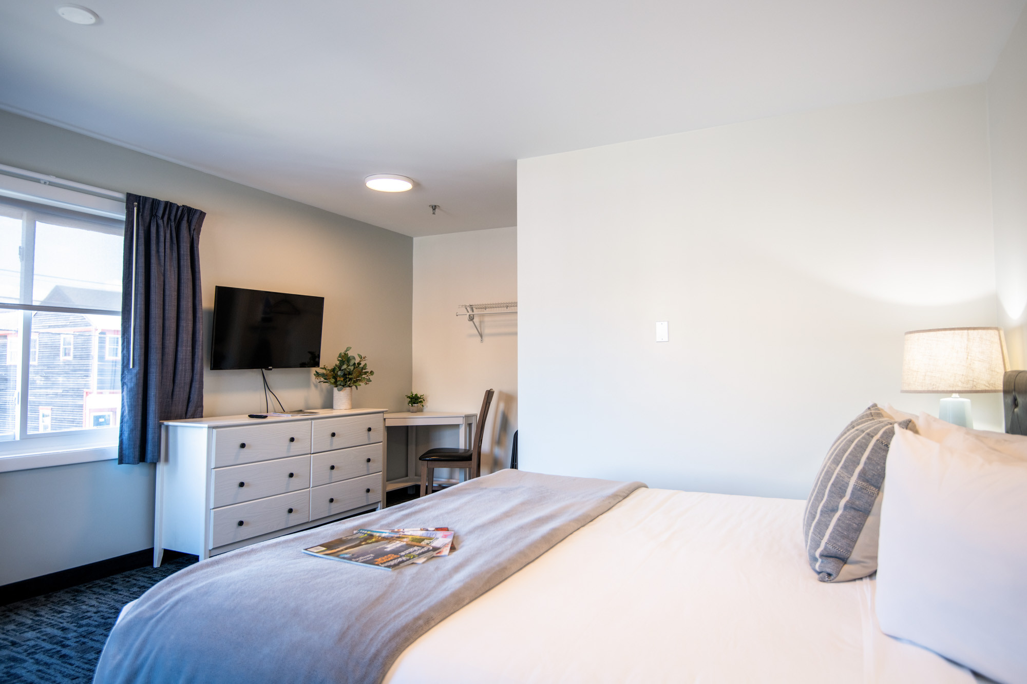 Comfortable seating area in a King Room at Main Street Motel, perfect for relaxing after a day exploring Bar Harbor.