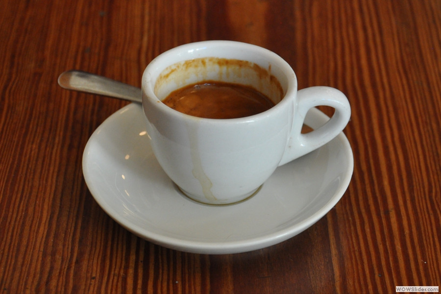My espresso at the 10th Street branch of Ninth Street Espresso, highlighting the cafe's focus on delivering quality coffee in the East Village.
