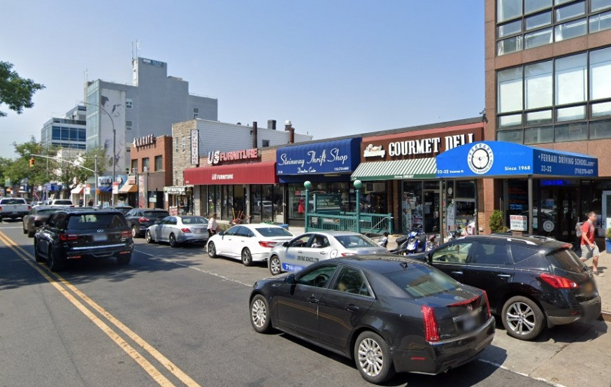 Cars and traffic congestion on Steinway Street in Astoria, Queens.