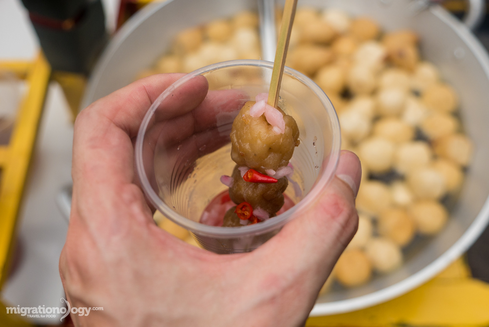 Fried fish balls and chicken balls, popular and affordable Filipino street food snacks.