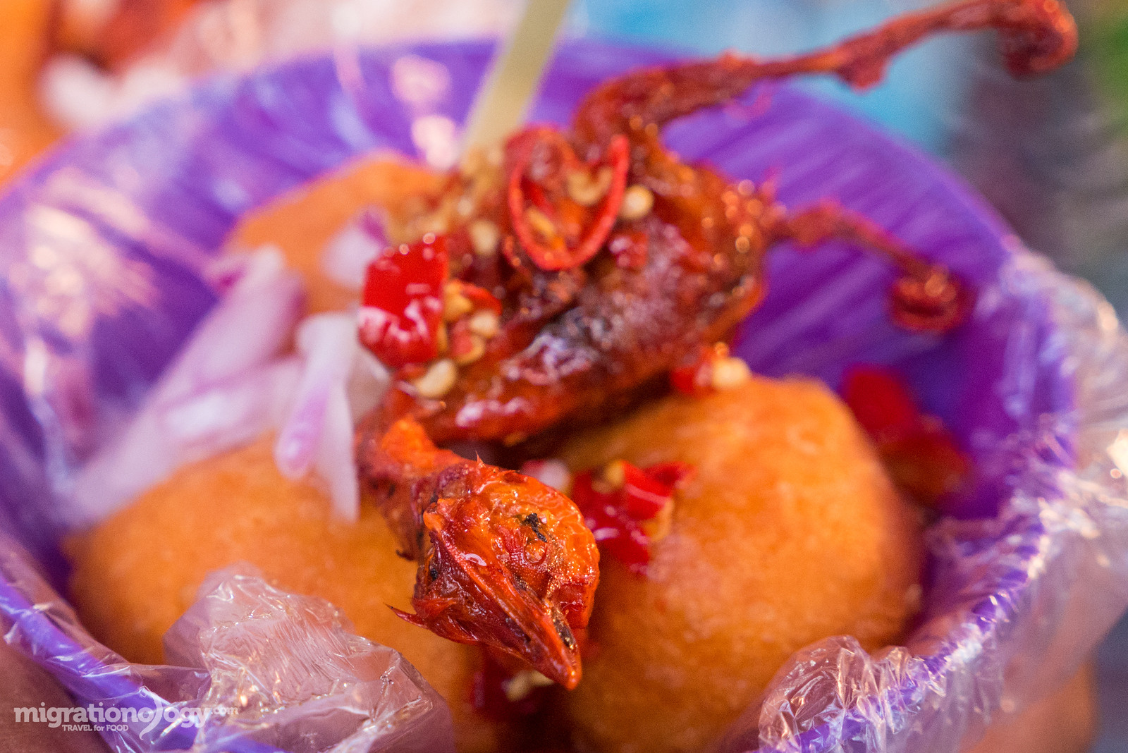 One-day-old fried chicken, a resourceful and unusual Filipino street food snack.