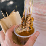 Grilled chicken intestines known as Isaw, a popular Filipino street food.