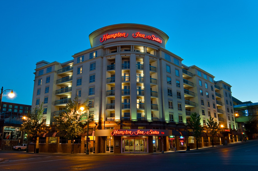 Hampton Inn &amp; Suites Memphis Beale Street exterior showcasing its modern facade and Beale Street proximity.