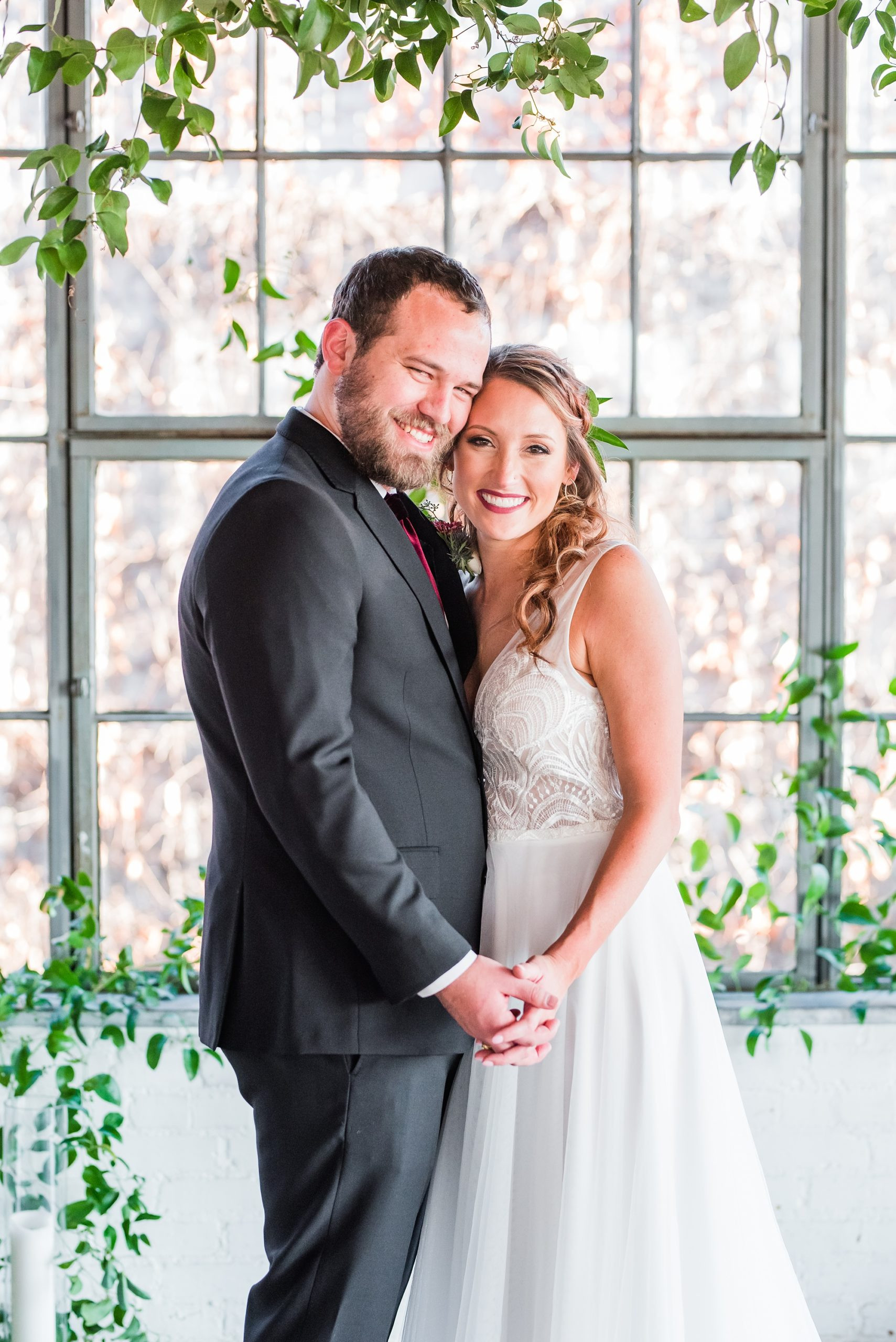 Candid Moment Bride and Groom Laughing at Hickory Street Annex Dallas Wedding