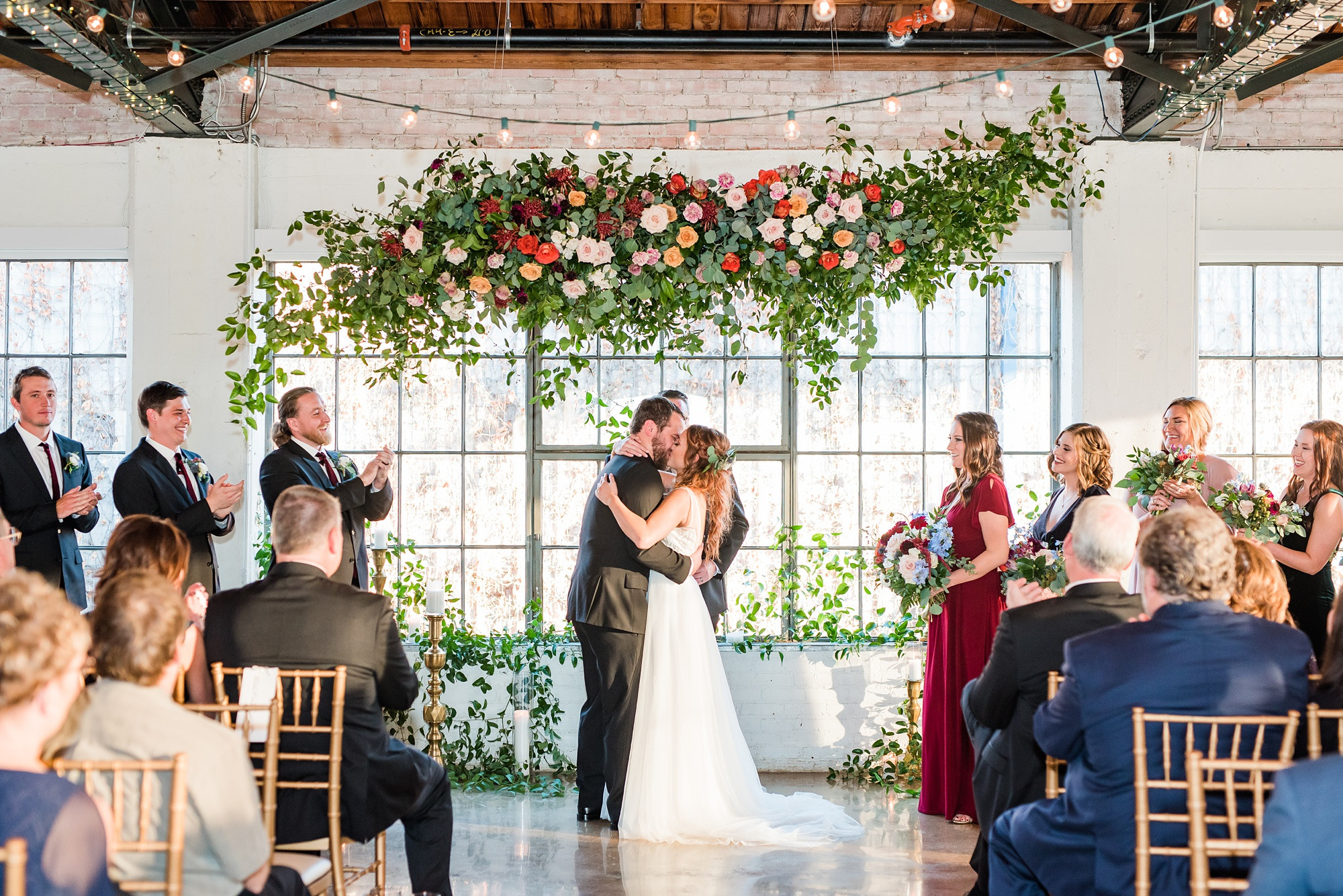 Bride and Groom Walking Hand in Hand at Hickory Street Annex Dallas