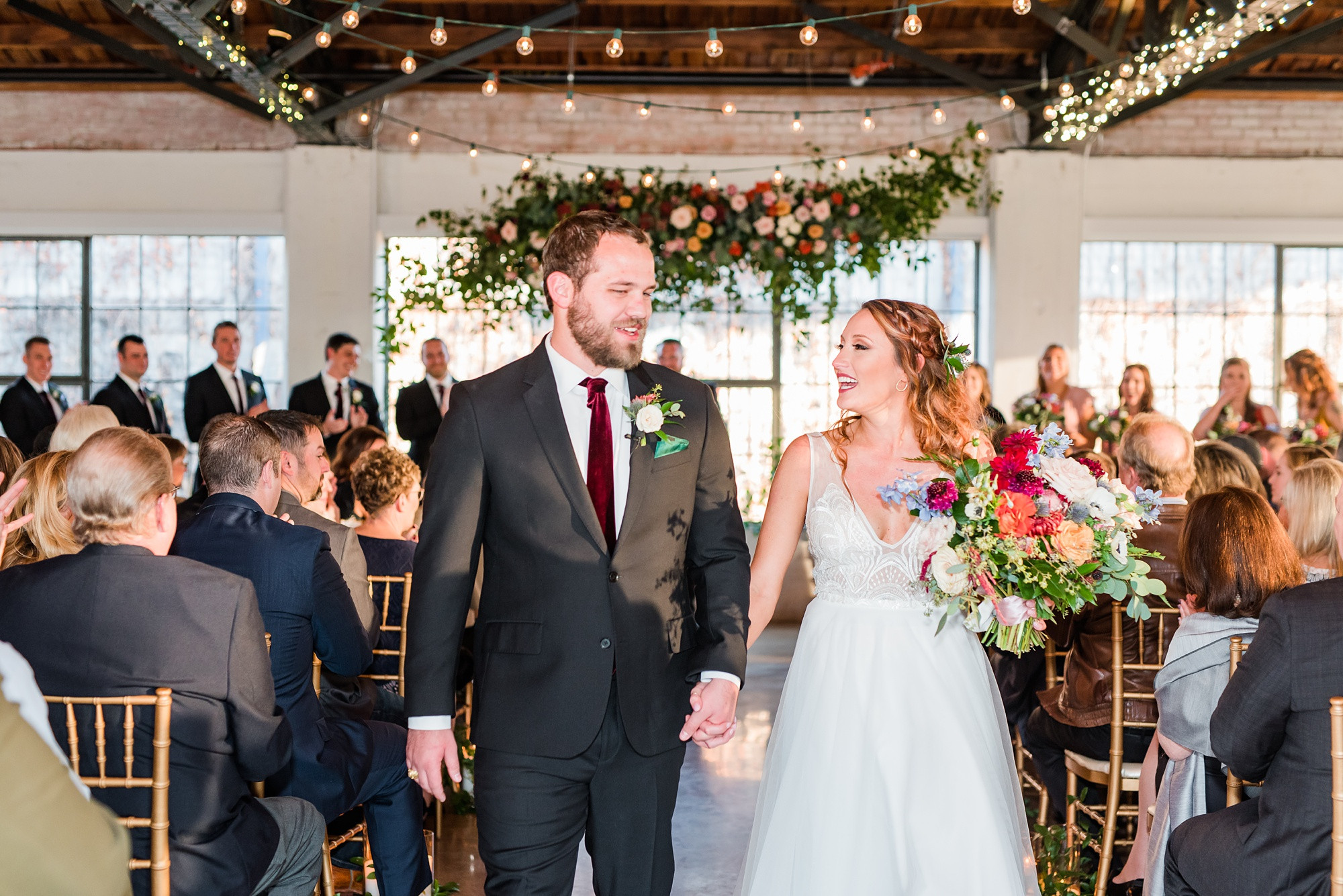 Bride and Groom Embracing at Hickory Street Annex Wedding Venue
