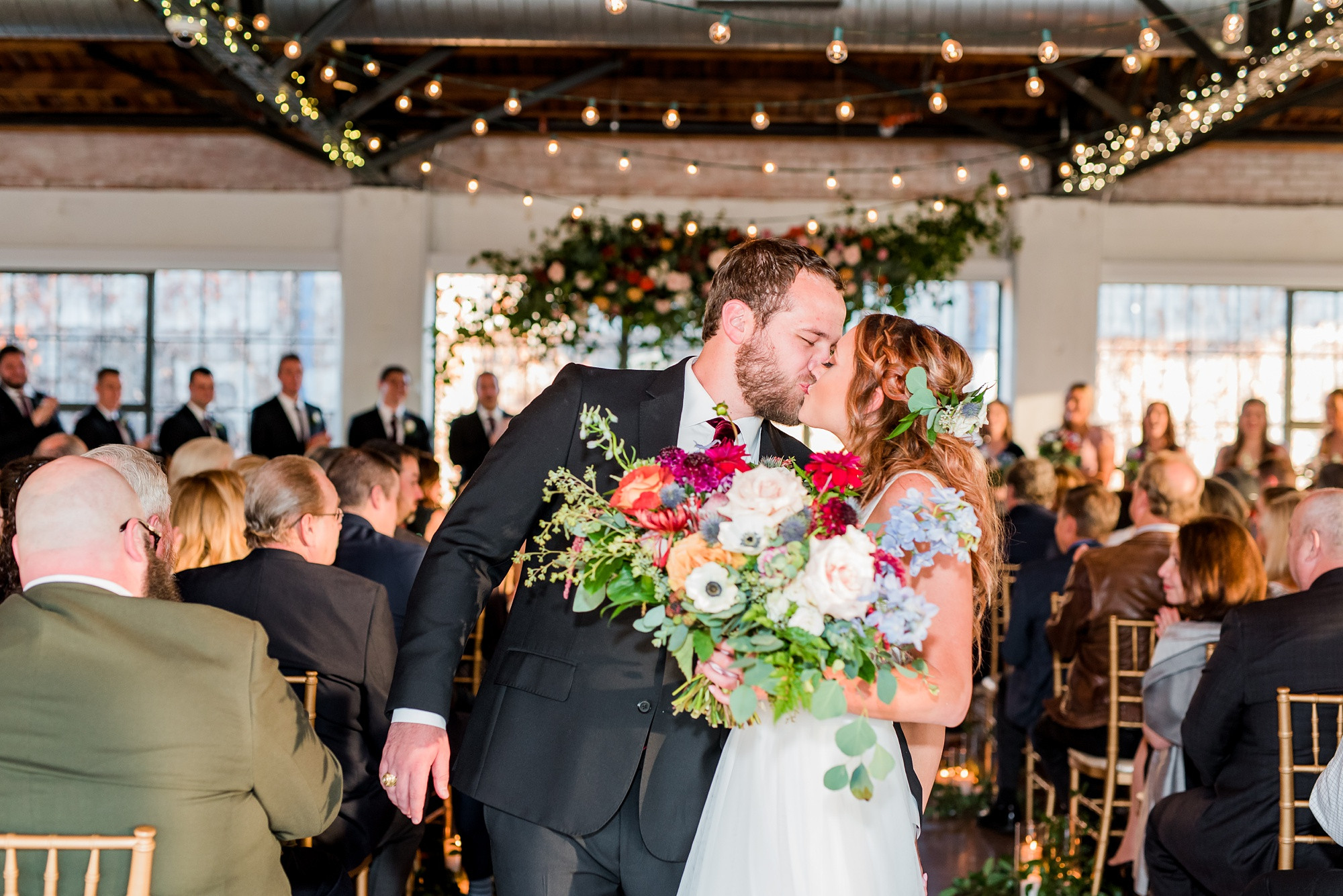 Bride and Groom Smiling at Each Other at Hickory Street Annex Dallas