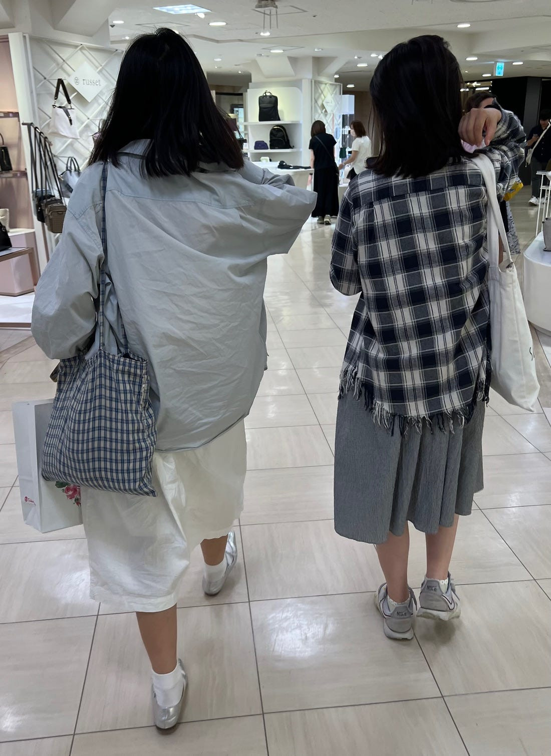 A close-up street style shot of stylish platform shoes, reflecting popular footwear choices in Japanese street fashion.