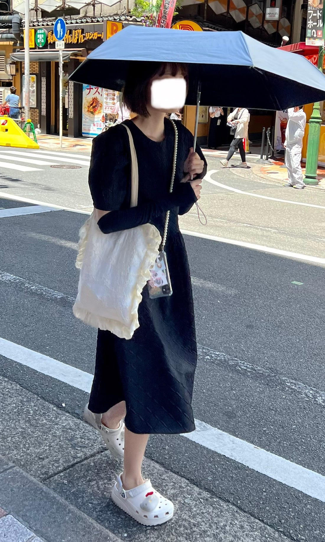 Street style photograph of a person in a vibrant and youthful kei-style outfit, illustrating the diversity of Japanese street fashion.