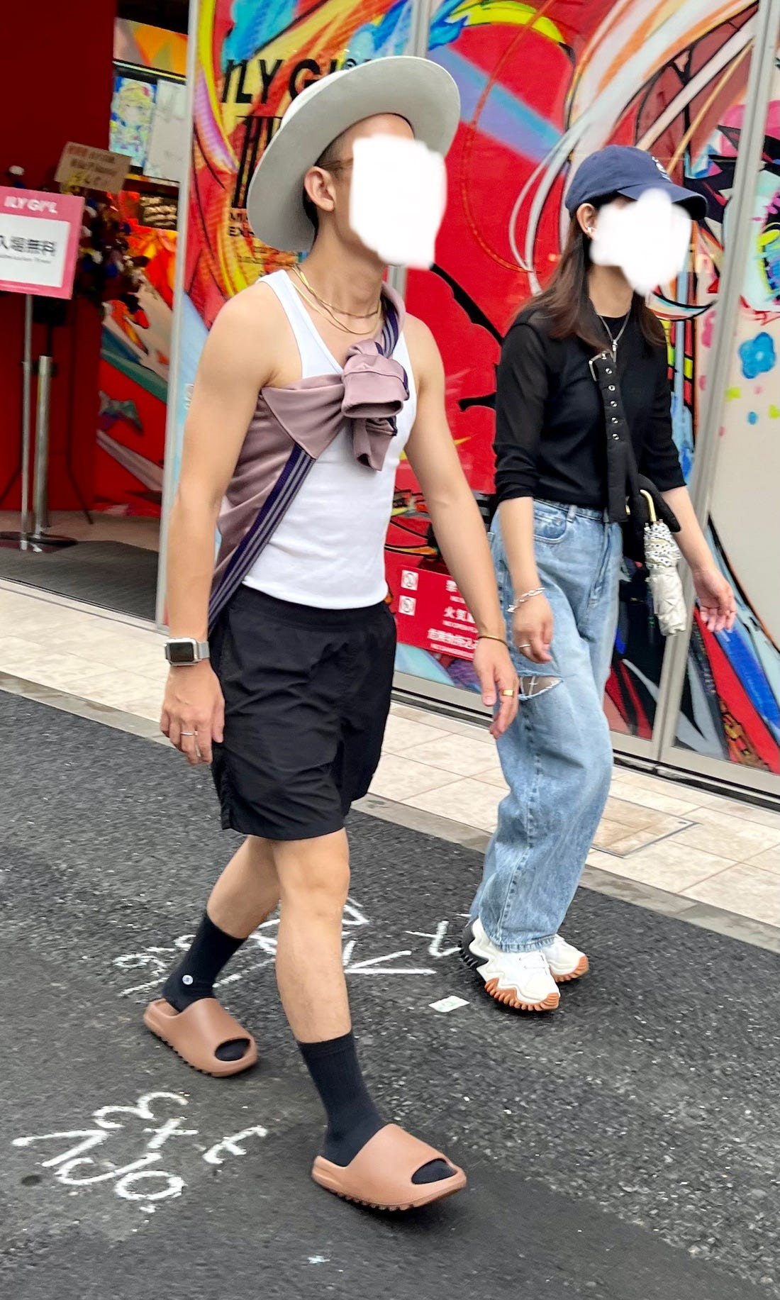 Street fashion image of a group of friends in coordinated casual wear, demonstrating the popularity of osoroi among young people in Japan.