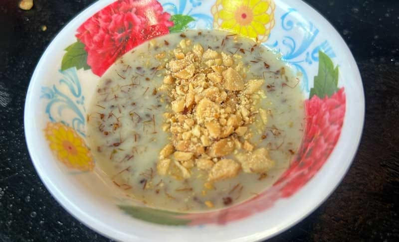Cambodian red ant sauce, a unique and flavorful dipping sauce made with crushed peanuts, offering a citrusy taste from formic acid, a highlight of Cambodian street food.