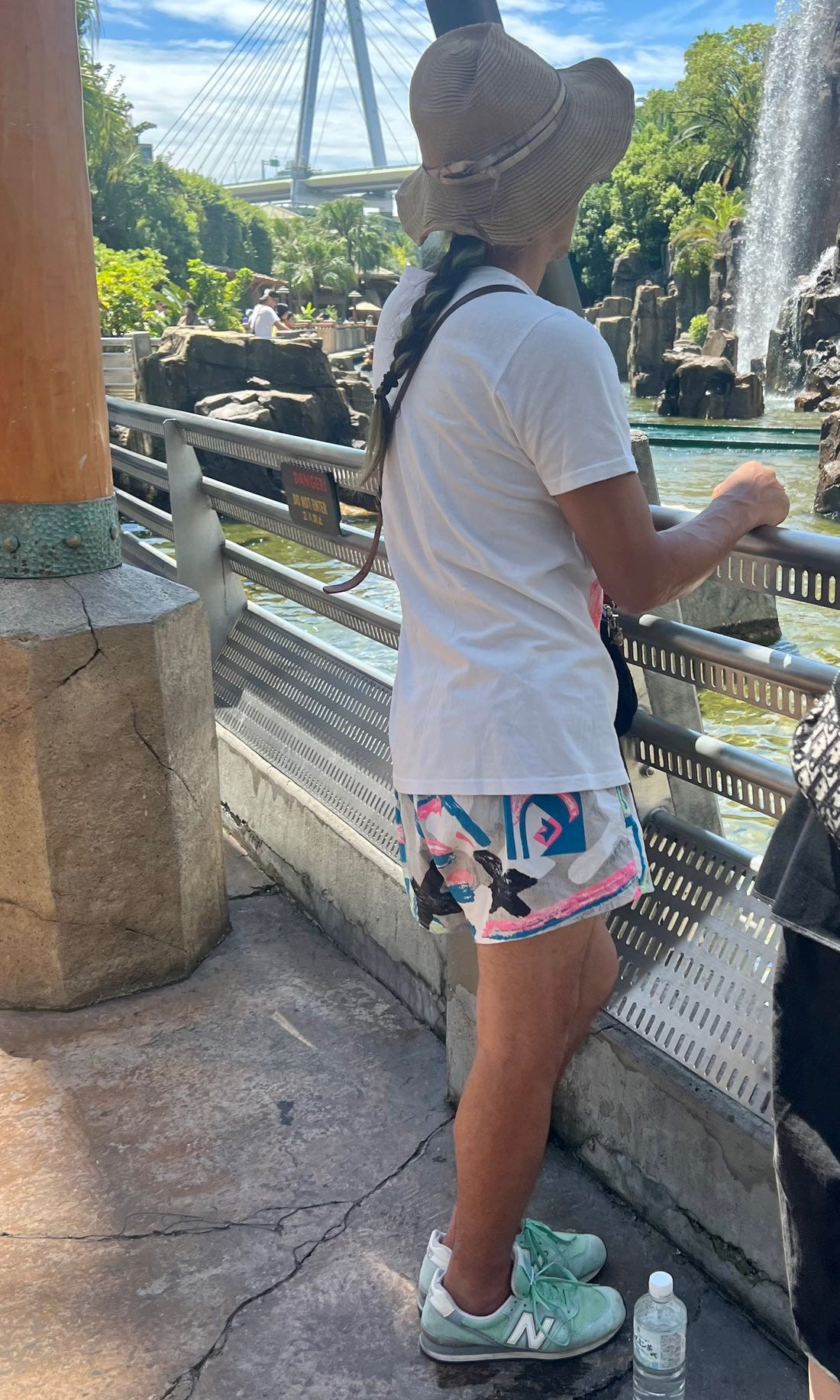 Street style photograph of a person in a colorful and playful outfit, illustrating the diverse range of styles within Japanese street fashion.
