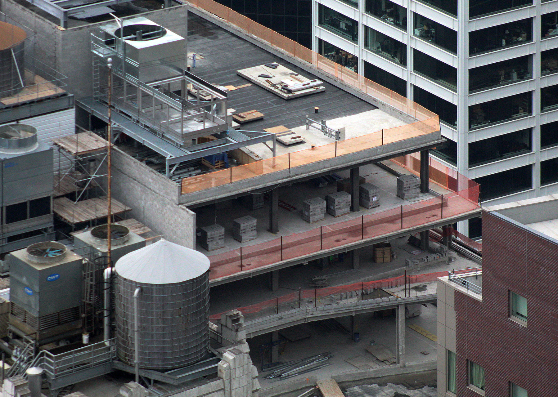 Exterior view of 160 Water Street NY NY, highlighting the completed facade replacement and ongoing expansion work.