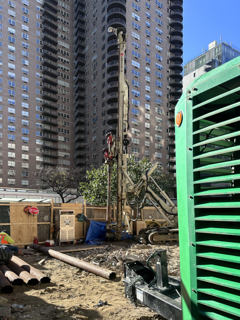 Close up view of excavator on the construction site at 171-179 East 86th Street