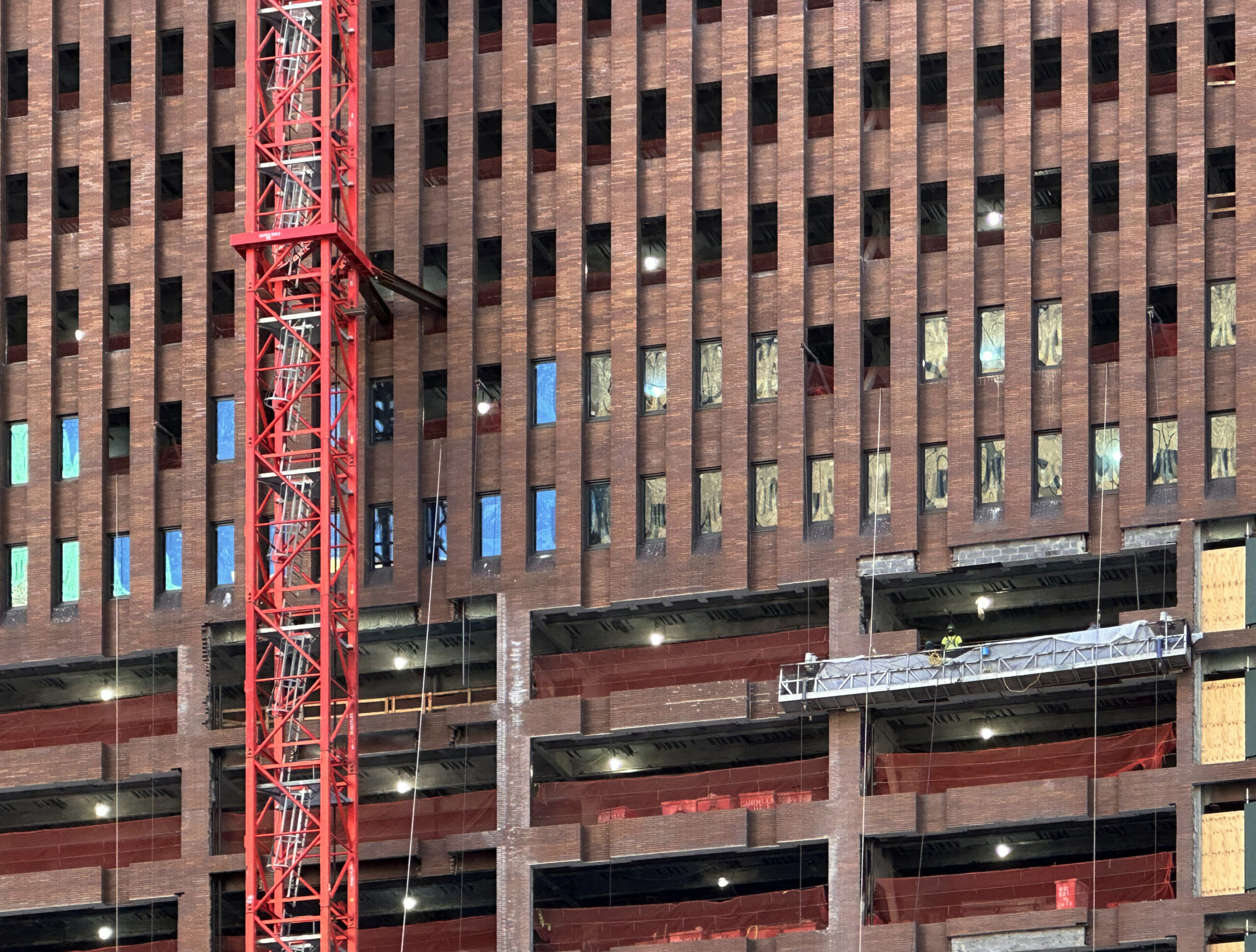 Detailed perspective of the steel framework and facade modifications at 25 Water Street in the Financial District.